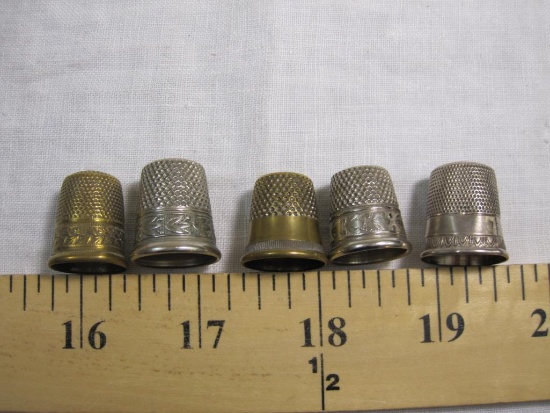 Lot of Collectible Decorated Thimbles including one marked sterling (2.8g)