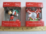 Two Hallmark Disney Christmas Tree Ornaments including Mickey 2014 Picture Frame and Mickey with