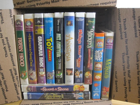 Children's VHS Tapes, including Toy Story, Rugrats in Paris, The Sword and The Stone, Buzz Lightyear