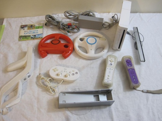 Nintendo Wii Game System with controllers and accessories includes: console, sensor bar, cables, Wii