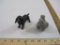 Two Dog Figures including grey spaghetti poodle (ceramic) and black and brown cast iron dog, 1 lb