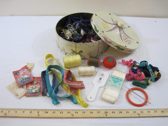 Vintage Carousel Tin with Sewing Supplies including embroidery floss, zippers, buttons and more, tin