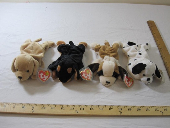 Four Dog TY Beanie Babies including Fetch, Dotty, Doby and Bernie, all tags included and attached, 1