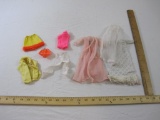 Lot of Vintage Barbie Clothes including Wedding Dress and Veil and many offical Barbie tagged items,