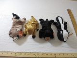 Four TY Beanie Babies including Ringo, Whisper, Blackie, and Stinky, all tags included and attached,