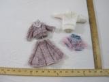 Set of 2 Vintage Barbie Outfits including sweaters and licensed Barbie skirt, 2 oz