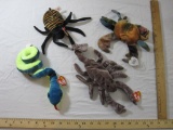 Four TY Beanie Babies including Hissy, Spinner, Stinger, and Claude, all tags included and attached,