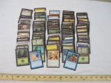 Lot of Magic the Gathering MTG Cards including lands, Manacles of Decay, Syncopate, and Jaded