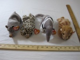 Four TY Beanie Babies including Ants, Freckles, Roary, and Spike, all tags included and attached, 1