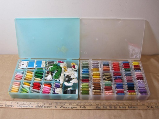 Two Plastic Storage Containers of Embroidery Thread