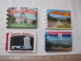 Lot of 4 small color souvenir photo booklets: North Dakota, South Dakota; 2 different albums on US