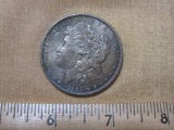 One 1889 Morgan Silver Dollar, 26.8 g