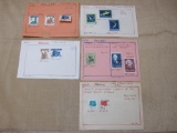 Lot of 13 1958 and 1959 canceled Poland postage stamps, mounted on 5 small sheets of paper. They