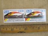 A pair of 2 different German Democratic Republic (DDR ) circa 1986 postage stamps showing rail