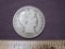 One 1899 Barber Silver Half Dollar, 11.9 g