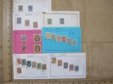 Lot of 29 Russia stamps, affixed in groups to paper. They date from 1875 to 1912.