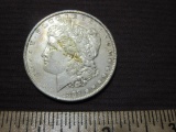 One 1889 Morgan Silver Dollar, 26.8 g