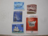 Five uncanceled Seychelles postage stamps, including 2 commemorating the first landing on Praslin in