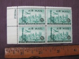 Block of 4 1947 New York City Skyline 15 cent US Air Mail postage stamps, #C35