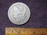 One 1899-O Morgan Silver Dollar, 26.1 g