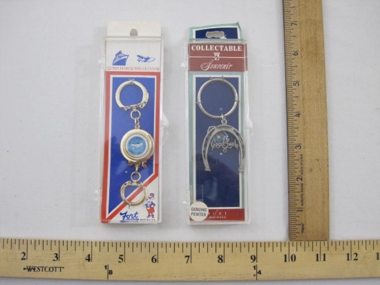 Two Souvenir Key Rings including Spruce Goose Long Beach CA and Good Luck Horseshoe Louisana, 3 oz