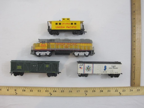 Four HO Scale Trains including Life-Like Union Pacific Diesel Locomotive, Life-Like UP 49940