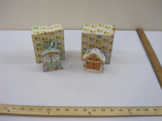 Two Precious Moments Porcelain Figurines including Boy with Puppy and Girl with Presents, in