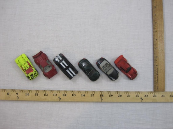 Six Assorted Matchbox Cars from 1980s-1990s, 7 oz