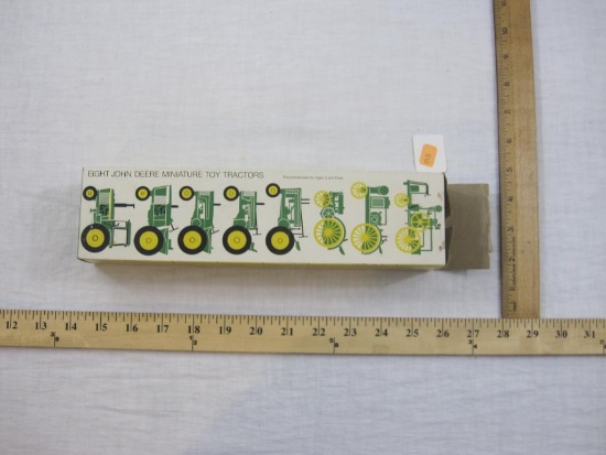 eight john deere miniature toy tractors