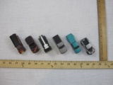 Six Hot Wheels Cars from 1980s-2000s including M&C Wrecker, customized C3500, and more, 9 oz