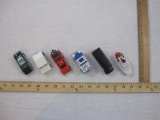 Six Hot Wheels and Matchbox Cars from 1980s-90s including Sea Rescue Boat, Police Prisoner Transport