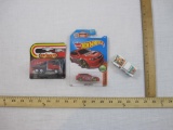 Three Die Cast Miniature Cars including Majorette Wrecker (sealed), Hot Wheels Subaru WRX STI Gravel