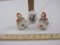 Three Salt and Pepper Shakers including set of girl with basket, 10 oz