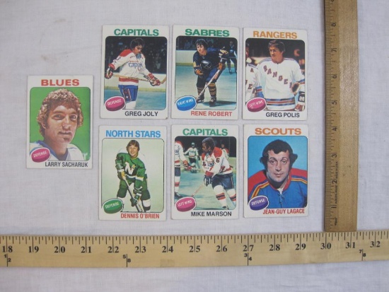 Seven 1975 NHL Hockey Trading Cards from Topps including Dennis O'Brien, Mike Marson, Greg Joly and