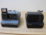 Two Polaroid Impulse Instamatic Cameras