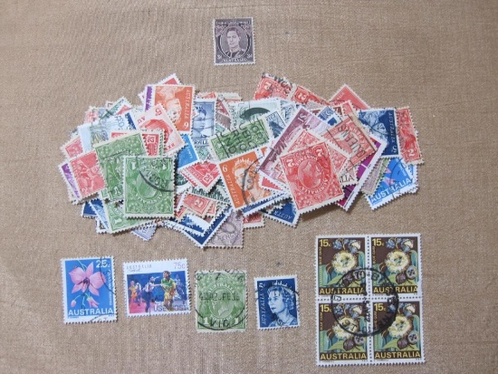 Lot of mostly canceled Australia postage stamps, many featuring Queen Elizabeth II. Also animals