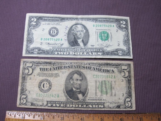 One US Series 1976 Jefferson $2 bill and one Series of 1934A Lincoln $5 bill