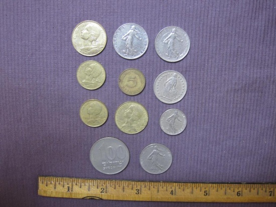 Lot includes 8 French coins (1960 to 1992); 1 1974 Swiss franc; 1 Israel 100 Sheqalim coin; 1977