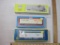 Three HO Scale Tropicana Orange Juice Reefers including AHM, Model Power, and unassembled kit from