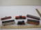 Six HO Scale Train Cars including Gulf Tanker, Lionel Seaboard Flatcar with Radioactive Waste,