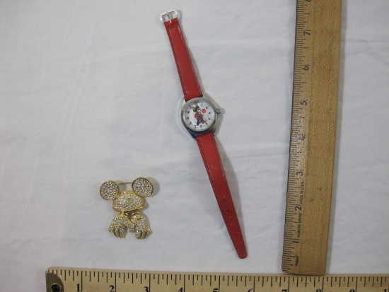 Two Disney Jewelry Items including Mickey Mouse Watch and gold tone pin, 2 oz