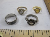 Four Vintage Rings approximately size 7, 1 oz