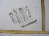 Five Pieces of Rogers Sterling Silver Ware, each piece sealed except knife, 133.5 g total weight, 5