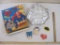 Wilton Super Hero Cake Pan Set, includes cake pan and plastic faces and shields for Batman and
