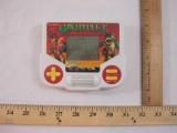 Electronic Gauntlet Handheld Game, 1988 Tiger Electronics, 4 oz