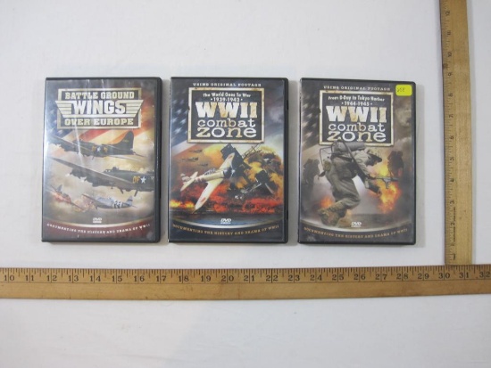 Three WWII DVDs including WWII Combat Zones and Battle Ground Wings Over Europe, 2006-7 Timeless