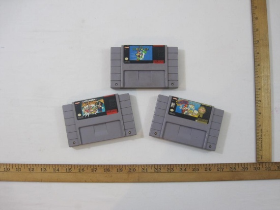 Three Super Nintendo Games including Super Mario All Stars, Super Mario World and Mario Paint (game