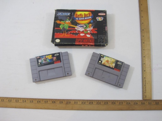Three Super Nintendo Games including Scooby-Doo Mystery, Speedy Gonzales Los Gatos Bandidos, and
