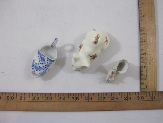 Three Ceramic Trinkets including Enesco Porcelain Cat with Holly Figurine, book and blue/white