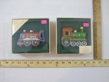 Two Hallmark Tin Locomotive Collector's Series Ornaments, 1983 & 1984, in original boxes, 9 oz